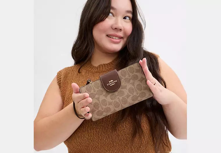 217 - COACH Phone Wallet In Signature Canvas