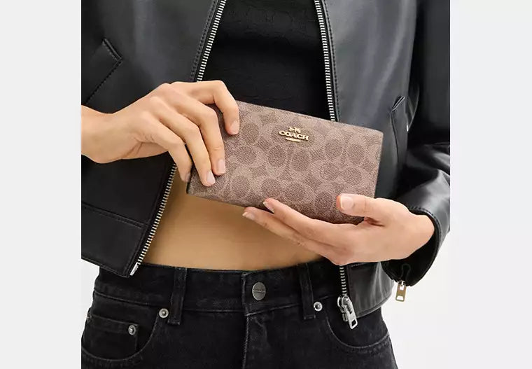 222 - COACH Slim Zip Wallet In Signature Canvas