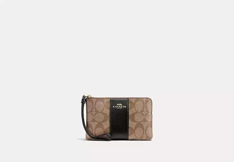233 - COACH Corner Zip Wristlet In Signature Canvas