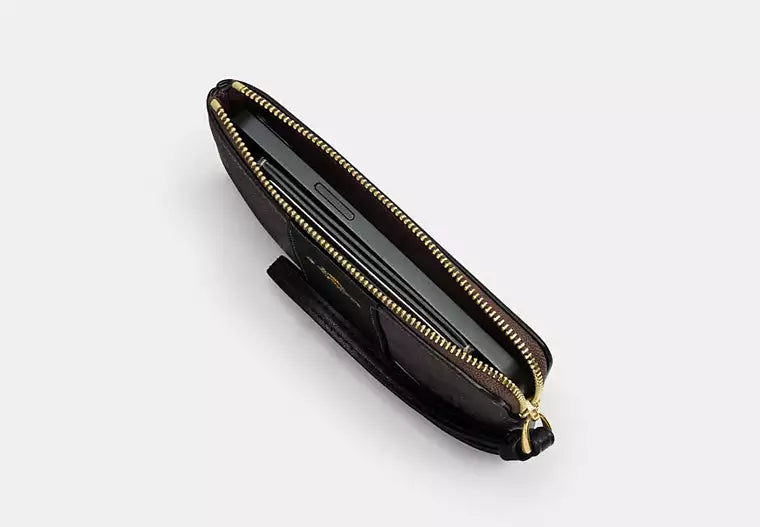 233 - COACH Corner Zip Wristlet In Signature Canvas