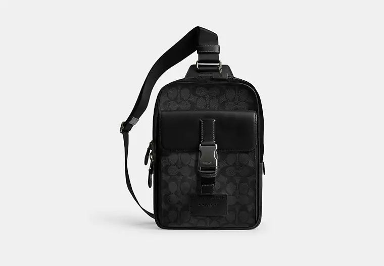 654 - COACH Track Pack In Signature Canvas