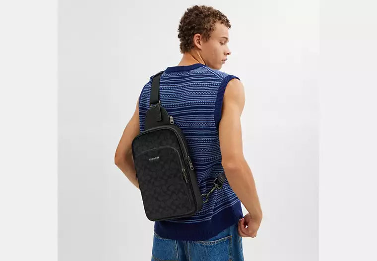 667 - COACH Ethan Pack In Signature Canvas