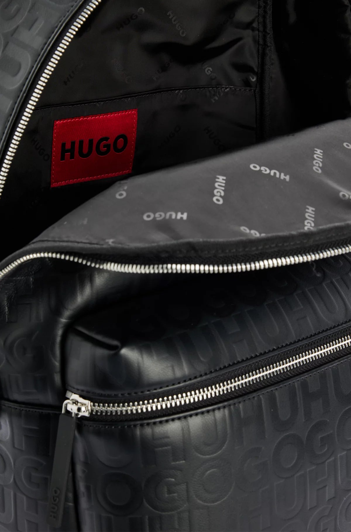 675 - HUGO BOSS Faux-leather backpack with repeat-logo motif