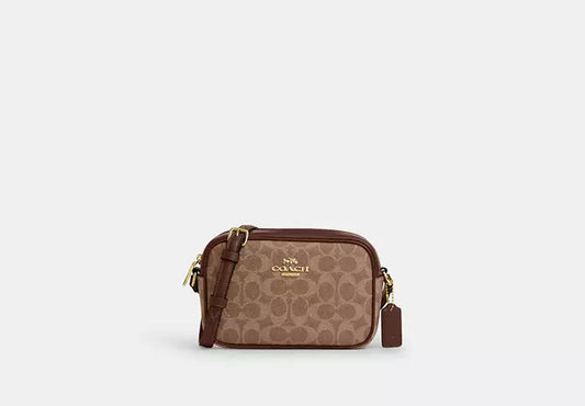 32 - SOBRE PEDIDO - COACH Mini Jamie Camera Bag In Signature Canvas